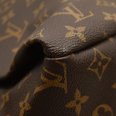 Louis Vuitton  Monogram Artsy MM CA2141