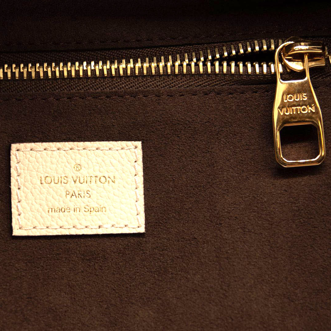 Louis Vuitton Cream Wild At Heart Giant Monogram Empreinte Neverfull –  Madison Avenue Couture