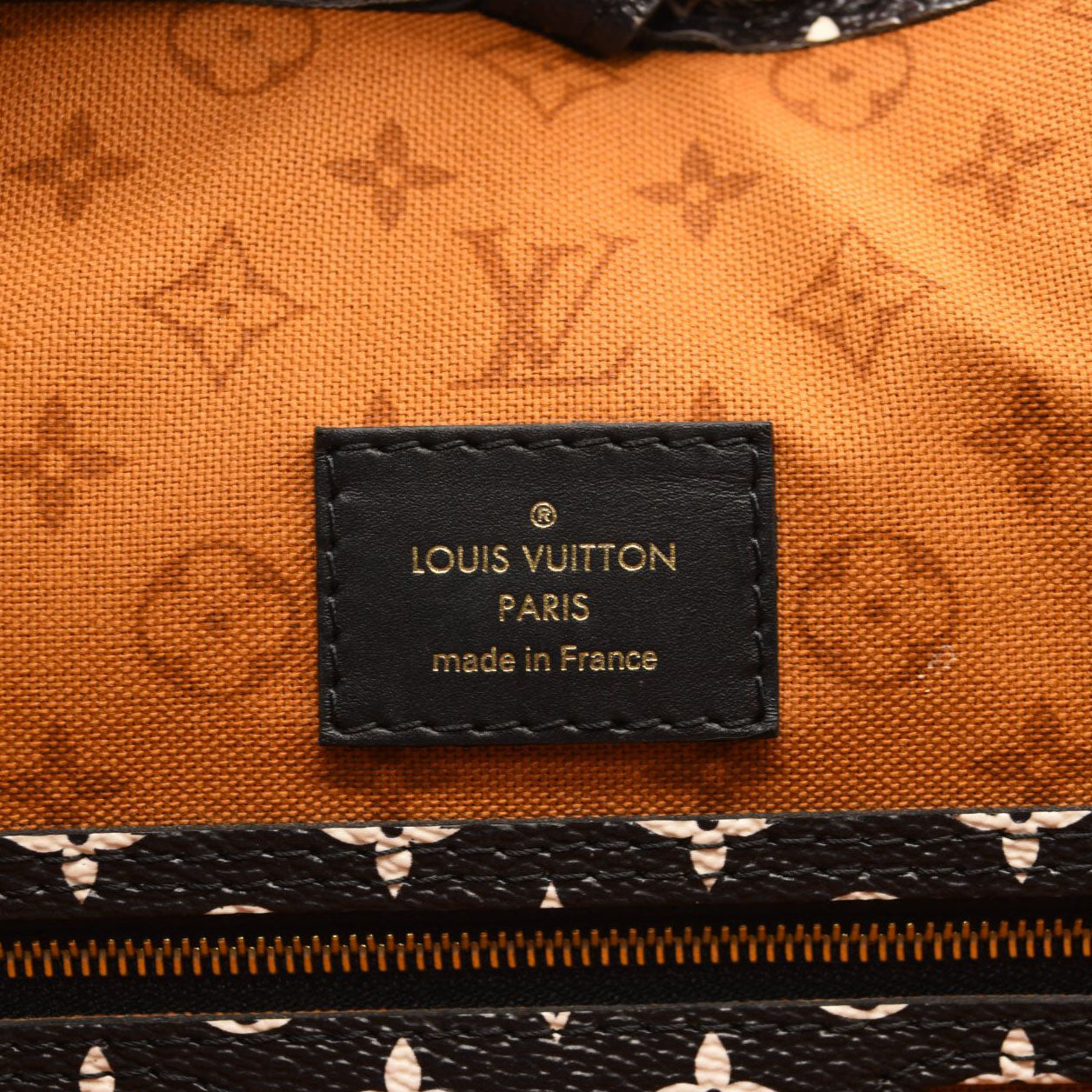 LOUIS VUITTON Authentic Jungle Giant Ivory Caramel Neverfull