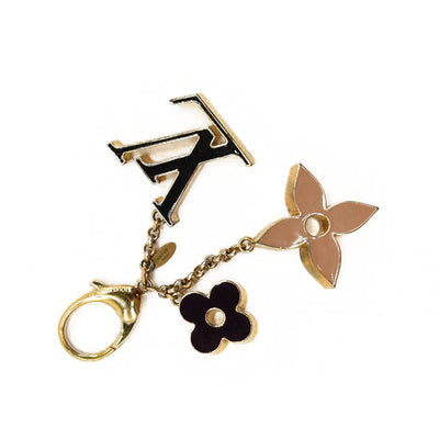 LOUIS VUITTON Metal Enamel Fleur De Monogram Bag Charm Dore