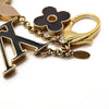 LOUIS VUITTON Metal Enamel Fleur De Monogram Bag Charm Dore