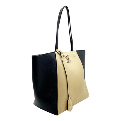 LOUIS VUITTON Lockme shopper bag in black with burgundy interior - OneLuxury