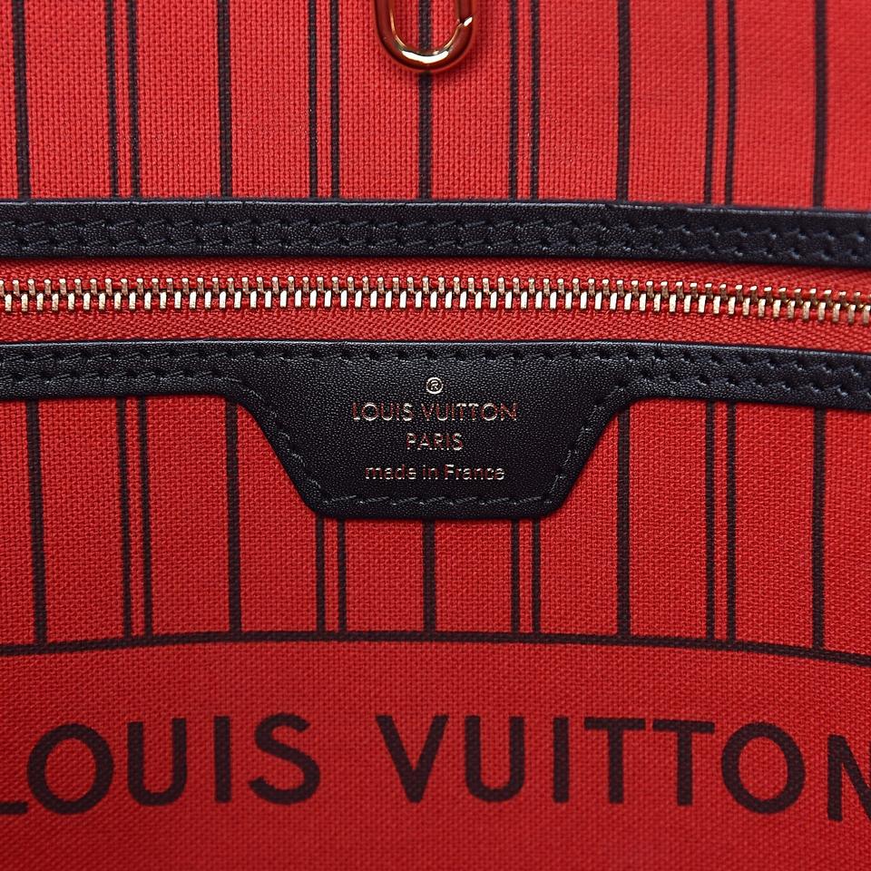 Louis Vuitton - Brown Monogram Neverfull World Tour MM Gold Tone
