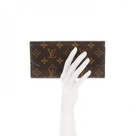 Emilie Long Flap Wallet in Monogram Empreinte leather, Gold Hardware