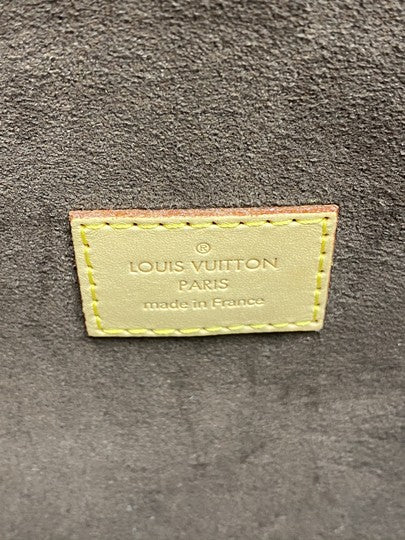 Louis Vuitton Pochette Mélanie Mm in Brown