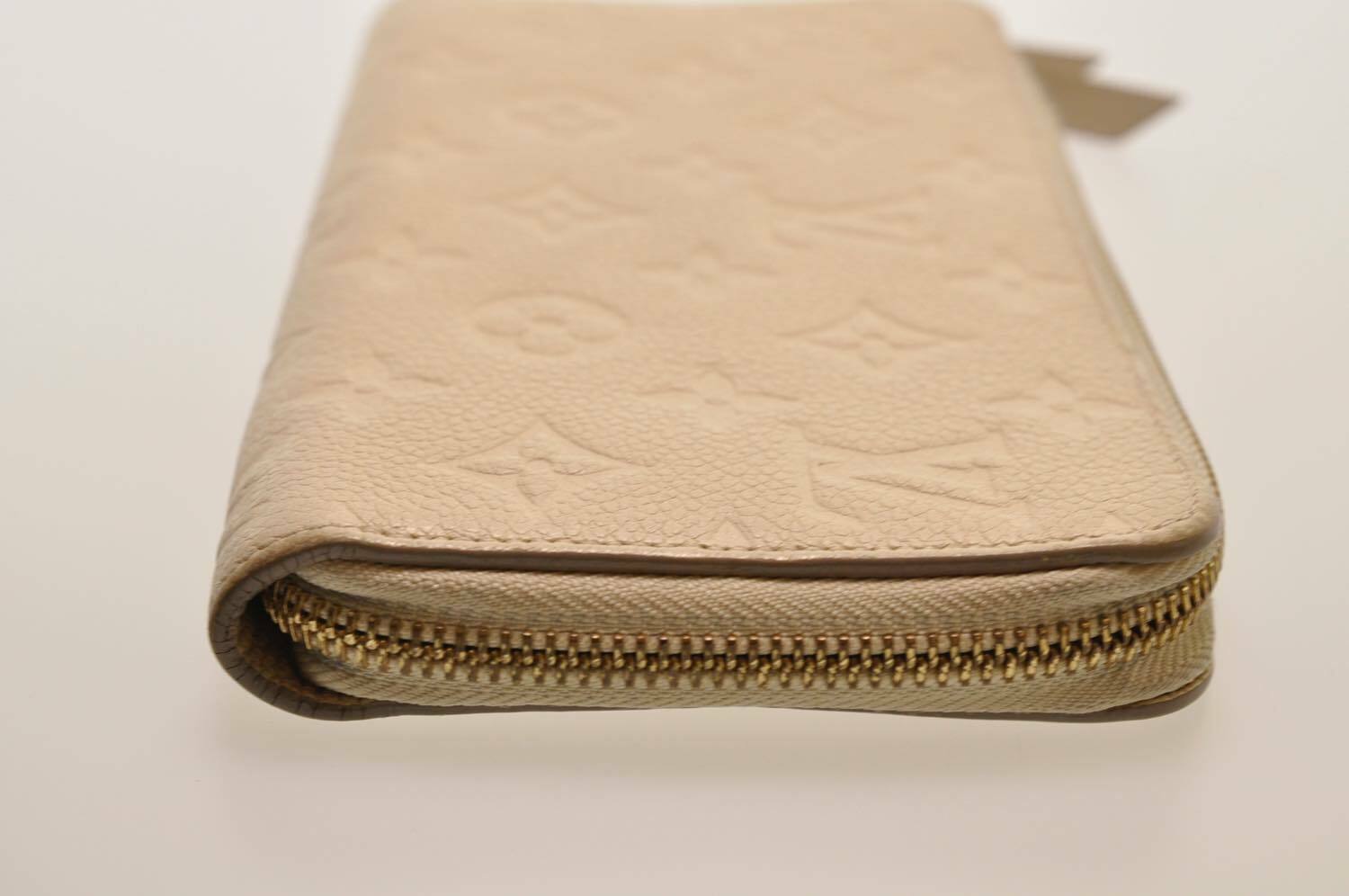 Louis Vuitton Ivory Monogram Empreinte Leather Secret Long Wallet