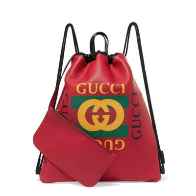 gucci on X: Crafted in supple, textured leather, a messenger bag